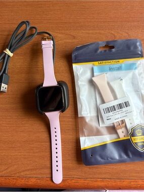 fitbit Pink Smartwatch with Extra Light Pink Band